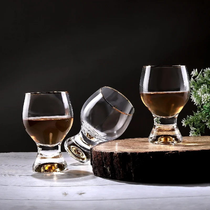 Wine Crystal Glass with Touch of Gold and Luxury in Hand