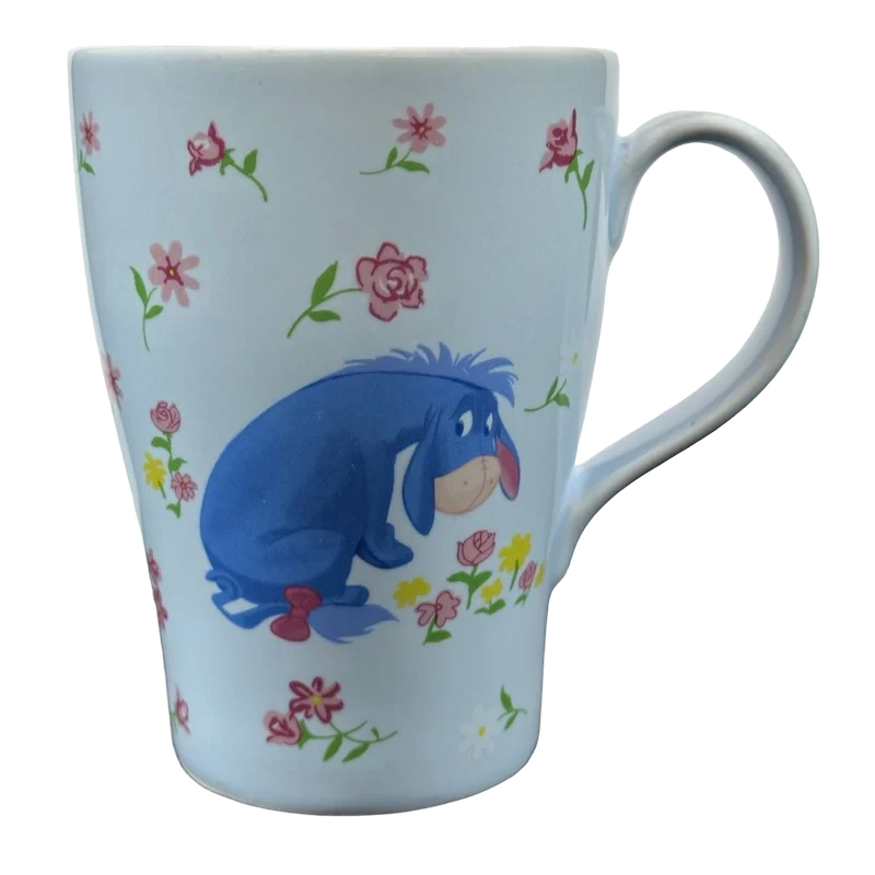 Eeyore Sitting Among Pink and Yellow Flowers Mug Disney Store